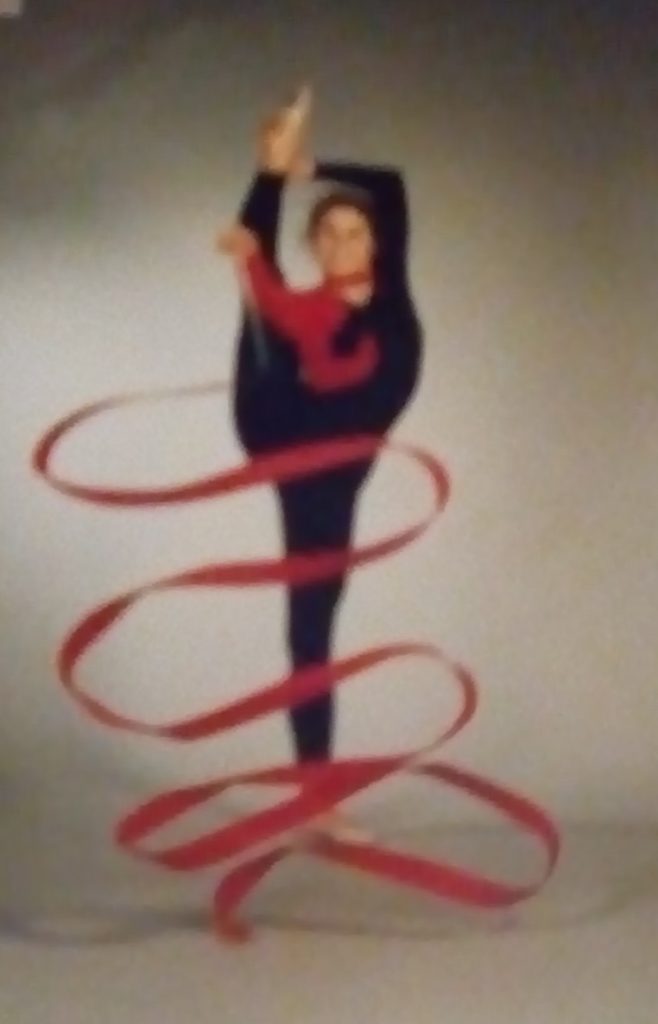 Alexandra als Gymnastin mit rotem Band